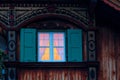 Old rural traditional chalet with detail, windows, balcony