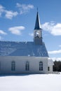 Old Rural White Church with Blue Sky in Winter Season