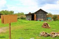 Old rural wooden house in russian village in summer sunny day. with a sign Royalty Free Stock Photo