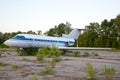 Old russian airplane is on the disused airfield