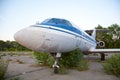 Old russian airplane is on the disused airfield