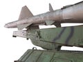 Old russian antiaircraft defense rocket launcher missiles isolated over white