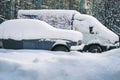 Old russian cars buried under a thick layer of snow Royalty Free Stock Photo
