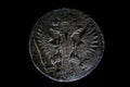 Old Russian coin 1 Denga 1798 on black isolated background