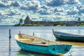 Old Russian fortress Oreshek, founded in 1323. In the foreground rowing boats. Located on the Walnut island at the source of the