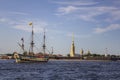 Old Russian military sailing ship Poltava at the parade in Saint Petersburg in the Neva River on the background of the Peter and Royalty Free Stock Photo