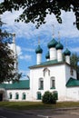 Old Russian orthodox church building in Yaroslavl. Tree trunks. Royalty Free Stock Photo