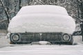 Old car covered with snow Royalty Free Stock Photo