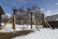 Old russian swing in Irkutsk architectural and ethnographic Museum `Taltsy`, Irkutsk region