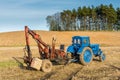 Old russian tractor with loader Royalty Free Stock Photo