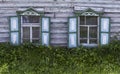 Old Russian Wooden Log Cabin with Green Shutters Royalty Free Stock Photo