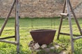 Old rust pot on the fire tourists kettle on hot campfire. Camping historical photo. Royalty Free Stock Photo