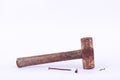 old rust Sledge hammer and rust nail tack used on white background tool isolated Royalty Free Stock Photo