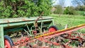 Old, rusted and abandoned farming machinery on a fruit farm Royalty Free Stock Photo