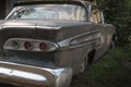 old rusted American car with bumper and taillights Royalty Free Stock Photo