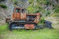 Old rusted bulldozer .