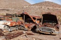 Old rusted car in junk yard Royalty Free Stock Photo