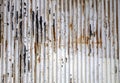 Old rusted corrugated zinc sheet wall