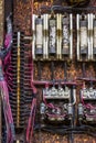 Old Rusted Electrical Panel with Fuses and Contacts in an Abandoned Automobile Factory I Royalty Free Stock Photo