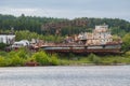 Old rusted gray industrial ships, stern view