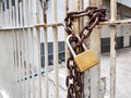 Old rusted lock rusted chain on rusty iron gate Royalty Free Stock Photo