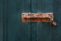 Old rusted lock on a wooden door or shutters Royalty Free Stock Photo