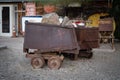 Old rusted mineral mine wagon full of stones Royalty Free Stock Photo