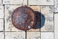 Old rusted mooring bollard on old stone pier background Royalty Free Stock Photo