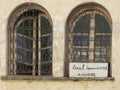 Old rusted ornate window security grills