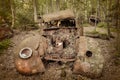 Old rusted scrap car in a forest Royalty Free Stock Photo