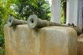 Old rusted ship cannon display