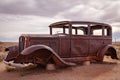 The old rusted Studebaker Landmark car that marks the start of the Painted Desert and its alignment with Route 66 in Arizona Royalty Free Stock Photo