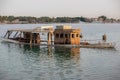 Old rusted sunk boat in red sea Royalty Free Stock Photo