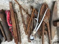 Old rusted tools over concrete Royalty Free Stock Photo