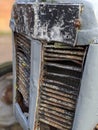 An old rusted tractor grille Royalty Free Stock Photo