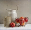 Old rustic aluminum cookwares and apples Royalty Free Stock Photo