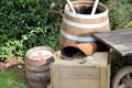 Old rustic antique wooden barrels, box and cart in medieval sett Royalty Free Stock Photo