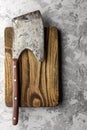 Old rustic axe for meat on a wooden board Royalty Free Stock Photo