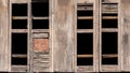 Old rustic barn wood board wall and windows background Royalty Free Stock Photo