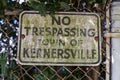 An old rustic black and white No Trespassing sign Royalty Free Stock Photo