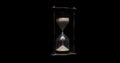 An old rustic brass hourglass Royalty Free Stock Photo