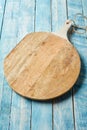 Old rustic circular wooden cutting board
