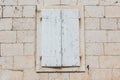 Old rustic closed white wooden window shutters isolated on white background Royalty Free Stock Photo