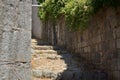 Old rustic coastal village path lane made of stone