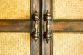 An old and rustic door latch on an wooden door Texture, background. fence, wall made of wooden slats Royalty Free Stock Photo