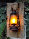 Old rustic lantern on the wall Royalty Free Stock Photo