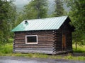 Rustic log cabin in Alaska Royalty Free Stock Photo