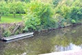 old rustic lonely boat on the river bank in Worcestershire in England