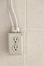 Old rustic North American electrical outlet on a brick wall Royalty Free Stock Photo