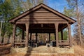 Rustic picnic shelter in a public park Royalty Free Stock Photo